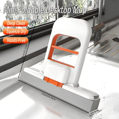 🔥Ends Tonight: Get 60% OFF Before It’s Gone!🔥 🧽Mini Foldable Desktop Mop - Hand-Free Wringing